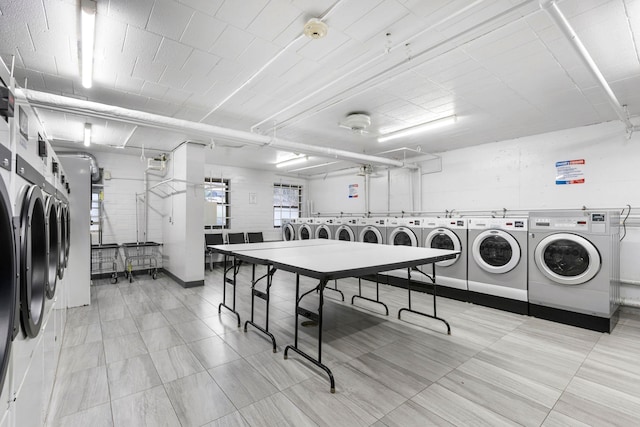 common laundry area with washing machine and clothes dryer