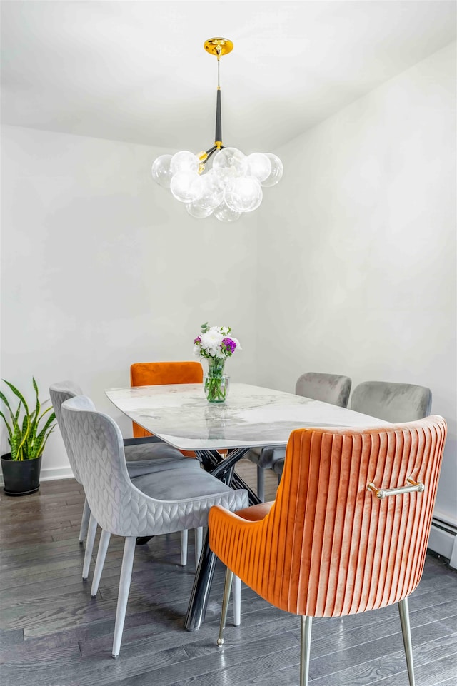 dining area with dark hardwood / wood-style floors