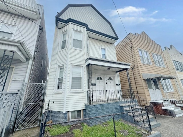 313 Pearsall Ave, Jersey City, NJ 07305 - view of front of property with a fenced front yard