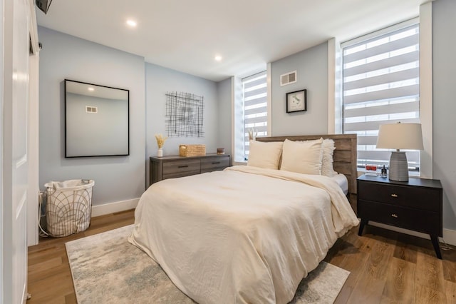 801 Willow Ave Unit 3R, Hoboken, NJ 07030 - bedroom featuring multiple windows, wood finished floors, baseboards, and recessed lighting