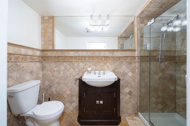 221 Clinton St Unit 3R, Hoboken, NJ 07030 - full bath with tile walls, vanity, toilet, a shower stall, and a wainscoted wall