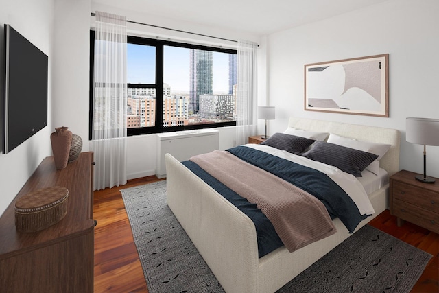 135 Montgomery St Unit 19A, Jersey City, NJ 07302 - bedroom featuring wood finished floors and a city view