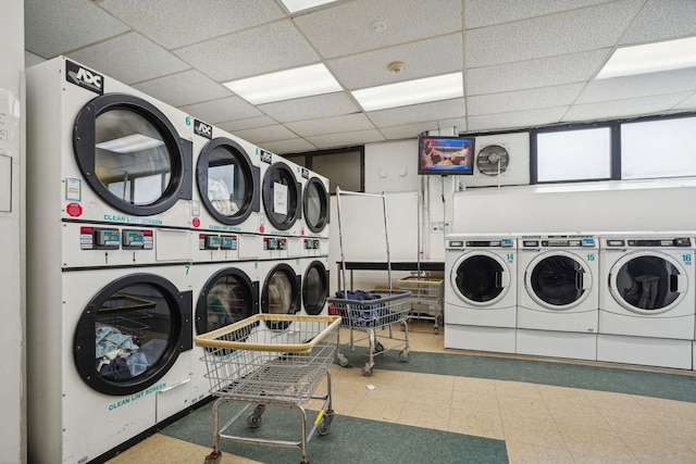 135 Montgomery St Unit 19A, Jersey City, NJ 07302 - community laundry room featuring washer and dryer, tile patterned floors, and estacked washer and dryer