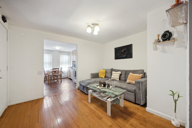 227 7th St, Jersey City, NJ 07302 - living area with baseboards and wood-type flooring