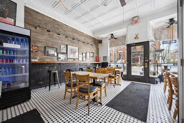 227 7th St, Jersey City, NJ 07302 - dining area with an ornate ceiling, wooden walls, and ceiling fan