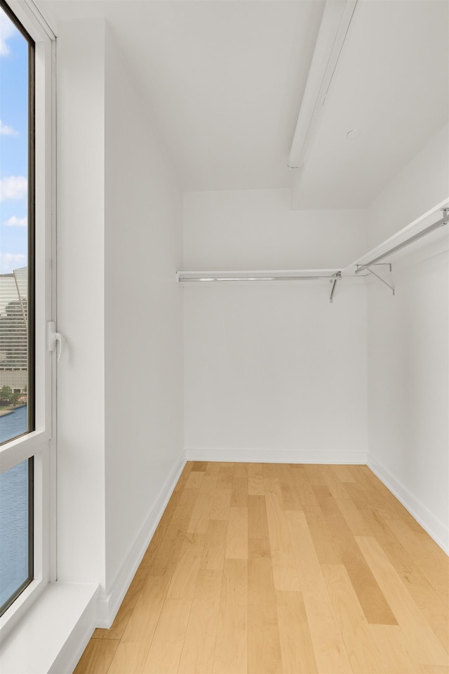 2 2nd St Unit 2106, Jersey City, NJ 07302 - walk in closet featuring light wood-style flooring