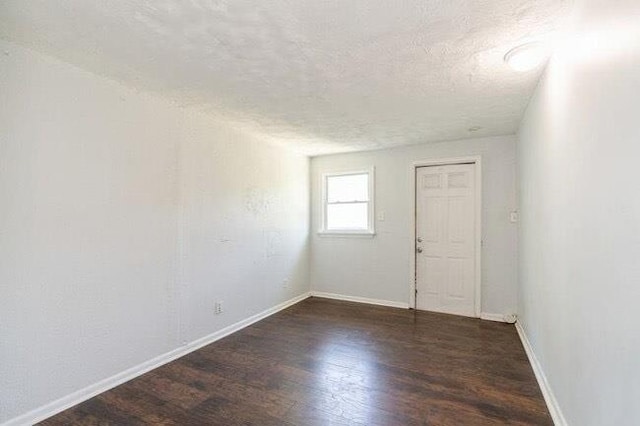 1109 12th St, North Bergen, NJ 07047 - empty room featuring wood finished floors and baseboards
