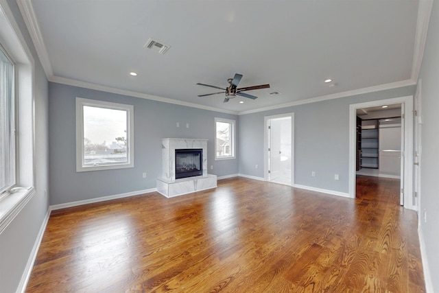 30 Cortland Pl, Cliffside Park, NJ 07010 - unfurnished living room featuring baseboards, visible vents, ornamental molding, wood finished floors, and a fireplace
