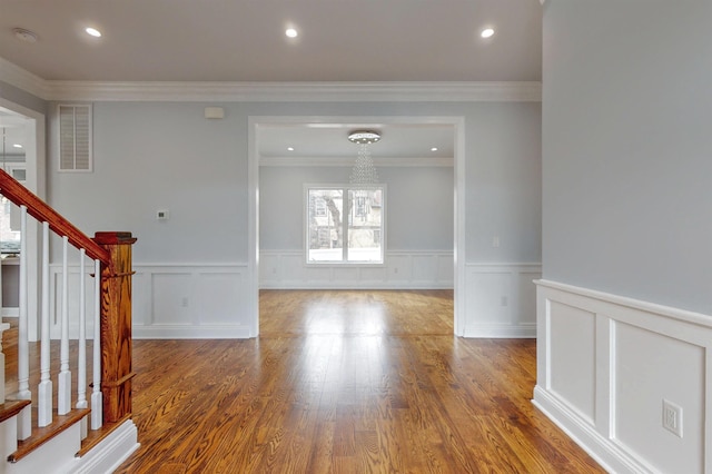 interior space with stairway, wood finished floors, visible vents, and recessed lighting