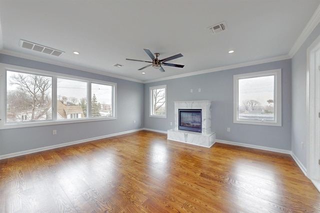 30 Cortland Pl, Cliffside Park, NJ 07010 - unfurnished living room with crown molding, visible vents, wood finished floors, and a high end fireplace