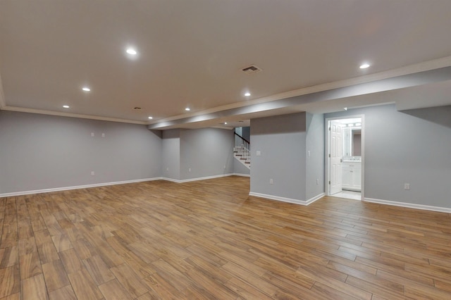 30 Cortland Pl, Cliffside Park, NJ 07010 - finished below grade area featuring recessed lighting, visible vents, stairway, wood finished floors, and baseboards