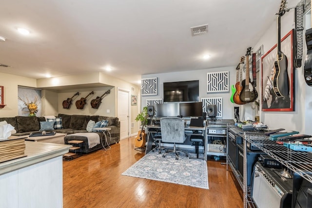 office space with hardwood / wood-style flooring