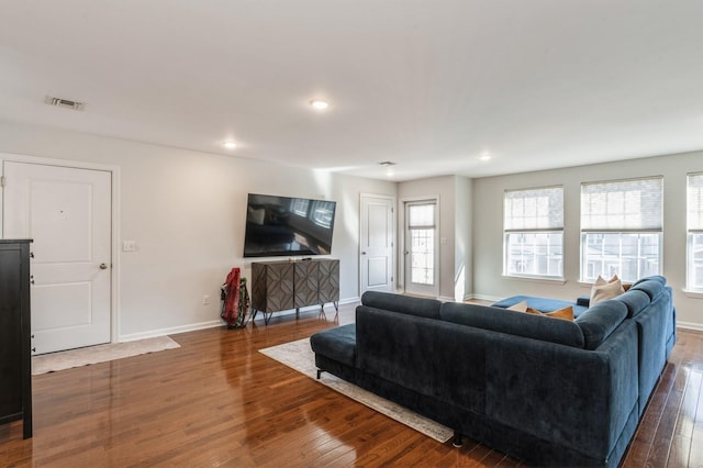 living room featuring dark hardwood / wood-style flooring