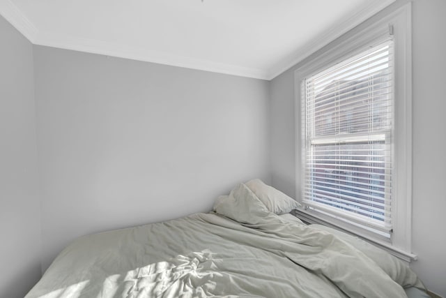 bedroom featuring ornamental molding