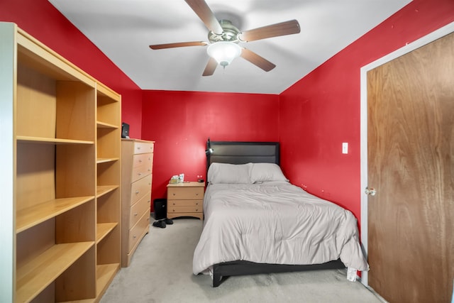 carpeted bedroom featuring a ceiling fan