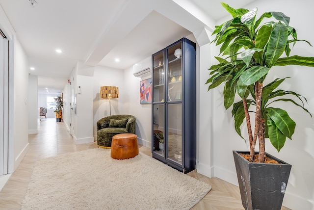 211 5th St Unit 1L, Jersey City, NJ 07302 - hallway with recessed lighting, baseboards, and a wall mounted AC
