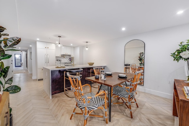 211 5th St Unit 1L, Jersey City, NJ 07302 - dining space featuring recessed lighting, baseboards, and arched walkways