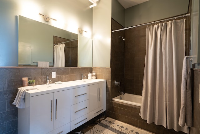 234 10th St Unit 606, Jersey City, NJ 07302 - bathroom featuring tile walls, tiled shower / bath combo, double vanity, and tile patterned floors
