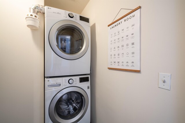 234 10th St Unit 606, Jersey City, NJ 07302 - laundry area featuring stacked washer / drying machine