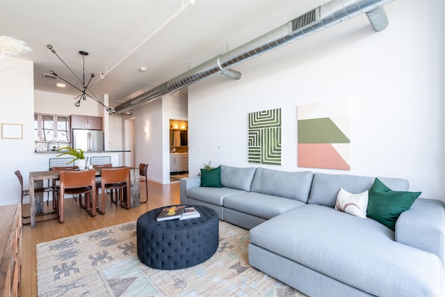 234 10th St Unit 606, Jersey City, NJ 07302 - living room with light wood-type flooring