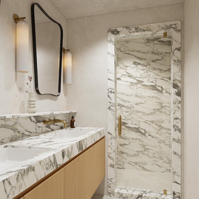 bathroom with vanity and a shower with shower door