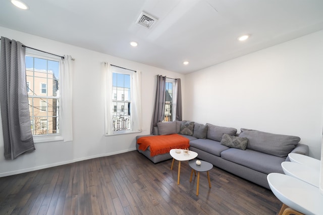 living room featuring dark hardwood / wood-style floors