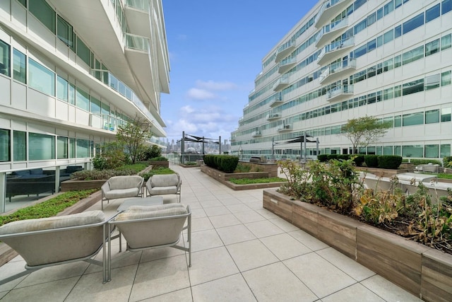 surrounding community featuring a patio area