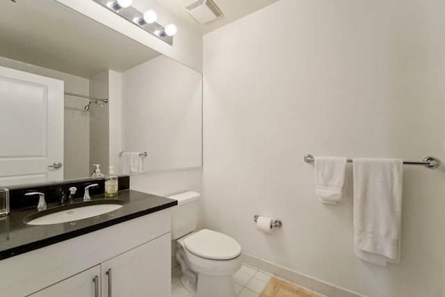 full bathroom with toilet, vanity, visible vents, a shower, and tile patterned floors