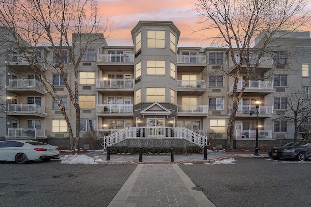 view of building exterior with stairway