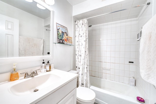 full bathroom with vanity, toilet, and shower / tub combo