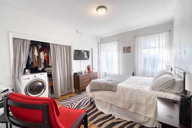 bedroom with washer / clothes dryer