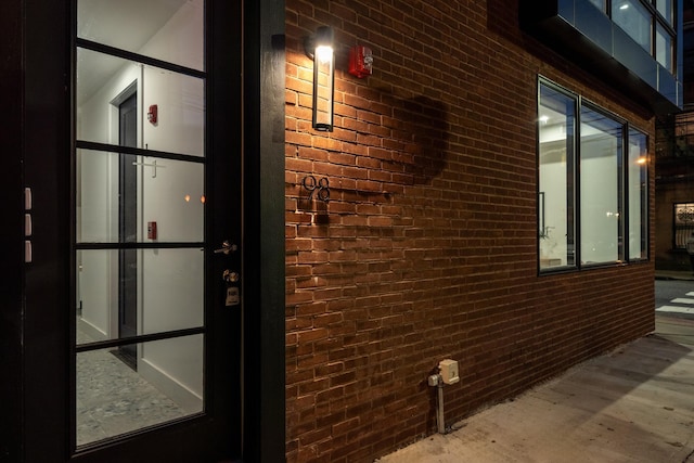 view of home's exterior featuring brick siding