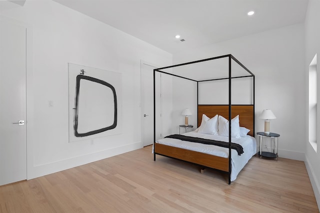 206 Fulton Ave # 2, Jersey City, NJ 07305 - bedroom with light wood-style floors, baseboards, and recessed lighting
