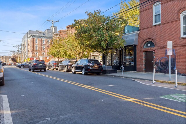 206 Fulton Ave # 2, Jersey City, NJ 07305 - view of asphalt street with sidewalks, curbs, and street lights