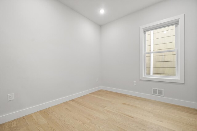 44 Bleecker St Unit 2, Jersey City, NJ 07307 - empty room featuring baseboards, light wood-type flooring, and recessed lighting