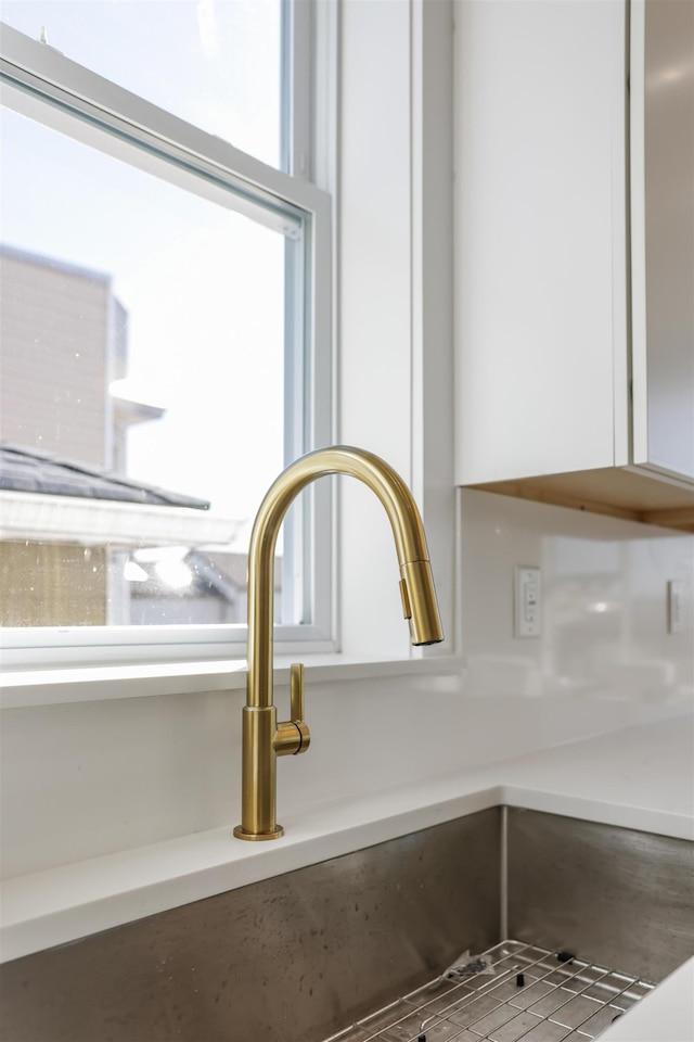 44 Bleecker St Unit 2, Jersey City, NJ 07307 - kitchen view of white cabinets and light countertops