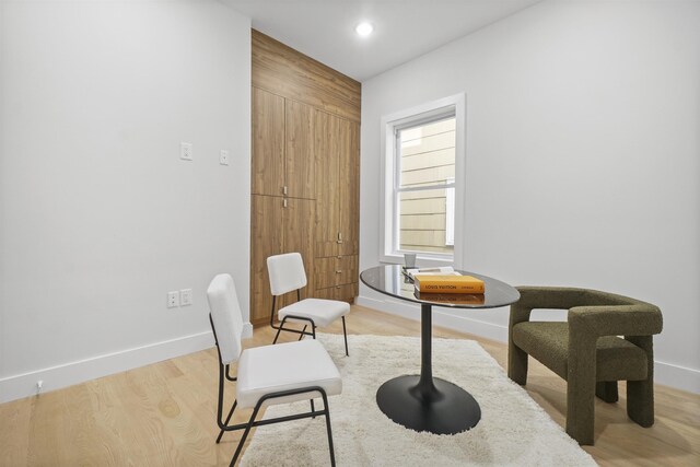 44 Bleecker St Unit 2, Jersey City, NJ 07307 - sitting room with baseboards and wood finished floors