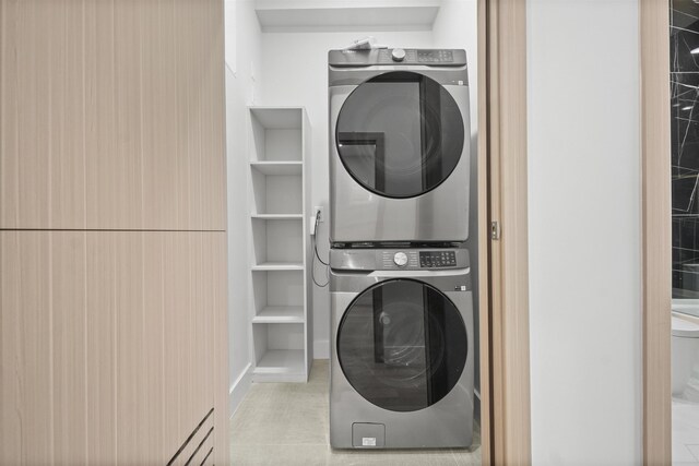 44 Bleecker St Unit 2, Jersey City, NJ 07307 - washroom with stacked washer / dryer