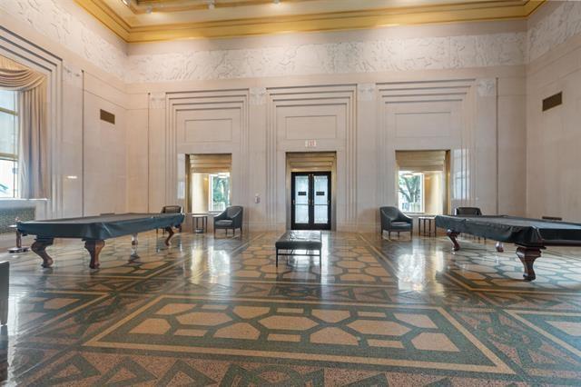 recreation room with a high ceiling, french doors, and billiards