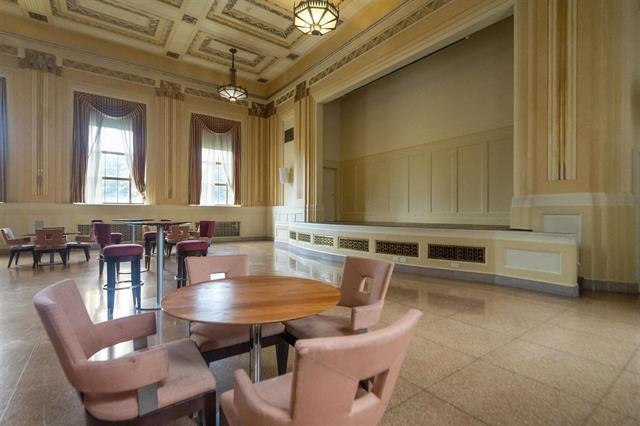 dining room with coffered ceiling and crown molding