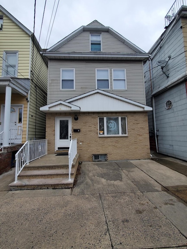 view of front of home with a patio area