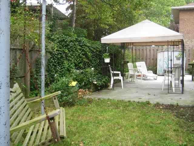 view of yard featuring a gazebo and a patio area