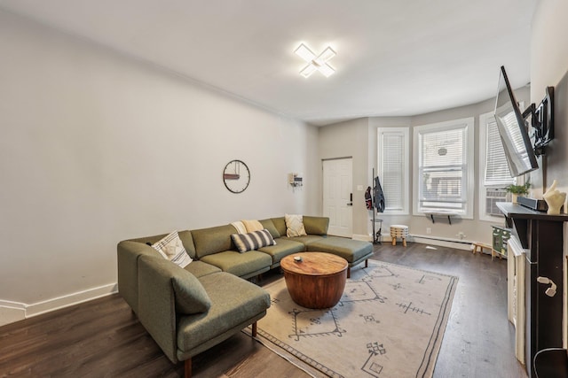 75 Poplar St, Jersey City, NJ 07307 - living area with dark wood finished floors and a baseboard heating unit