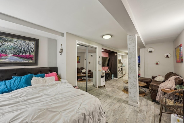 75 Poplar St, Jersey City, NJ 07307 - bedroom featuring light wood-style floors