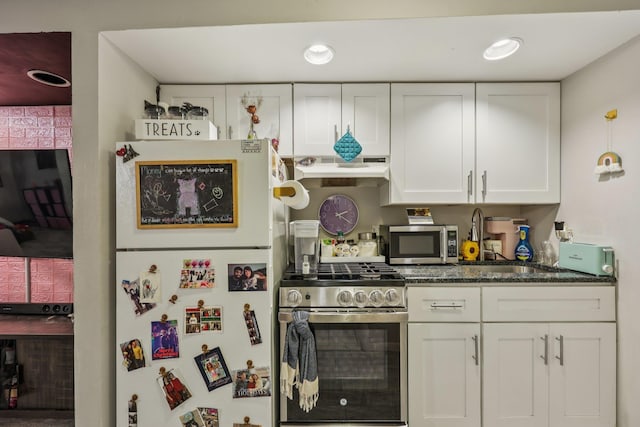 75 Poplar St, Jersey City, NJ 07307 - kitchen with stainless steel appliances, under cabinet range hood, and white cabinets