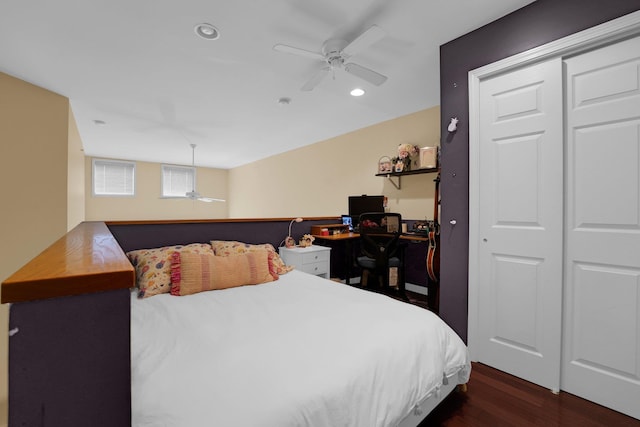 bedroom featuring dark hardwood / wood-style floors and ceiling fan