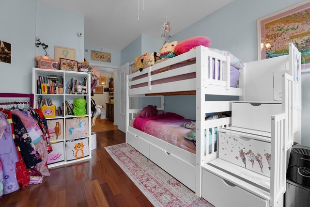 bedroom featuring dark wood-type flooring