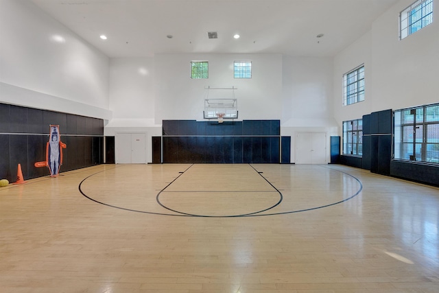 view of basketball court featuring a wealth of natural light