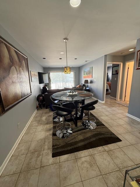 603 55th St Unit 204, West New York, NJ 07093 - dining area with light tile patterned floors, baseboards, and recessed lighting