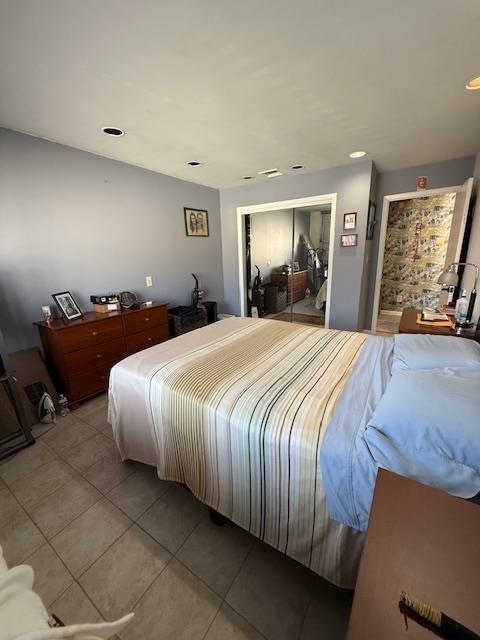 603 55th St Unit 204, West New York, NJ 07093 - bedroom featuring light tile patterned floors and recessed lighting